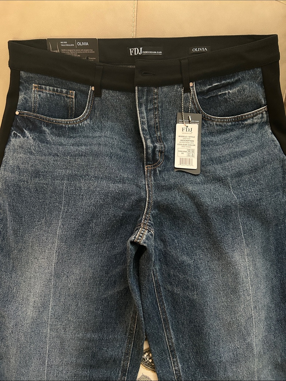 FDJ. Olivia Mixed Media Women’s Jeans with Black side stripes.